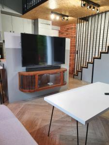 TV a/nebo společenská místnost v ubytování Apartament Hania