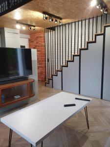 TV a/nebo společenská místnost v ubytování Apartament Hania