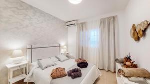 Postel nebo postele na pokoji v ubytování VILLA ANIL Lanzarote