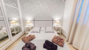 Postel nebo postele na pokoji v ubytování VILLA ANIL Lanzarote