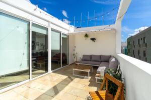 Un Lugar House Canteras - Coliving的阳台或露台