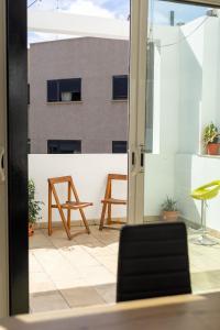 Un Lugar House Canteras - Coliving的阳台或露台