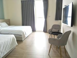 Postel nebo postele na pokoji v ubytování Good moment B&B