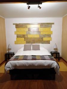 Cama o camas de una habitación en Mapa Hostel