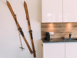 A kitchen or kitchenette at Tauern Lodge XL