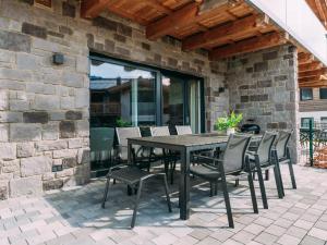 A patio or other outdoor area at Tauern Lodge XL