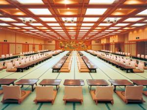 an empty pool hall with desks and chairs at Mikazuki Sea-Park Hotel Katsuura in Katsuura