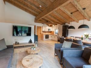 Telewizja i/lub zestaw kina domowego w obiekcie Tauernlodge Krimml 2B