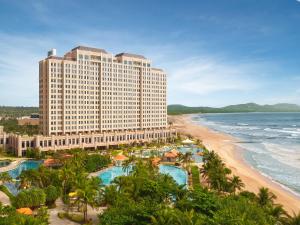 a view of a hotel and the beach at Holiday Inn Resort Ho Tram Beach by IHG in Ho Tram