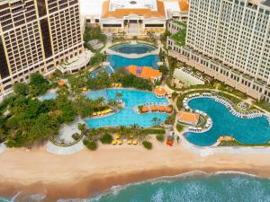 an aerial view of a resort with a beach at Holiday Inn Resort Ho Tram Beach by IHG in Ho Tram