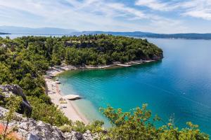 an island in the middle of a large body of water at Adria Croatia in Dramalj