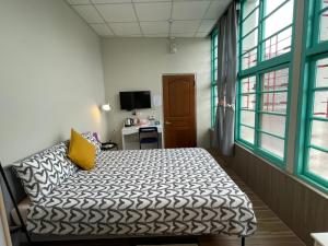 Un ou plusieurs lits dans un hébergement de l'établissement ShinYuan BNB