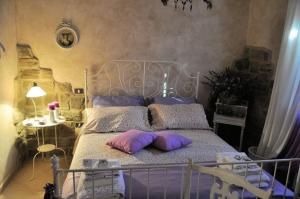 Postel nebo postele na pokoji v ubytování B&B Fonte Cugno + 37 fotografií