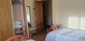 Postel nebo postele na pokoji v ubytování Casa Rural Las Canchaleras