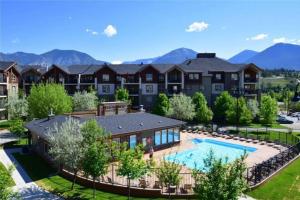 an aerial view of a home with a swimming pool at Lookout Pointe, Lakeview, Pool, Hot Tub, Gym in Invermere
