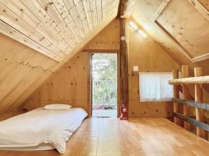 Log Park Dochidol Ranch客房内的一张或多张床位