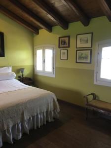 מיטה או מיטות בחדר ב-B&B Casa del Bosco