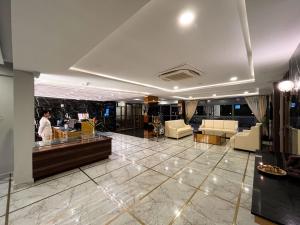 Posezení v ubytování Clarks Inn , Airport Bangalore