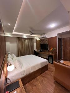 Postel nebo postele na pokoji v ubytování Clarks Inn , Airport Bangalore