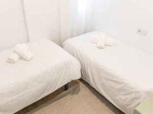 Posteľ alebo postele v izbe v ubytovaní La Casa de Nano