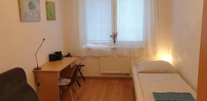 Posteľ alebo postele v izbe v ubytovaní APARTMÁN BRATISLAVA city & parking