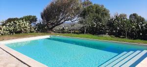 Der Swimmingpool an oder in der Nähe von Lispusada Agriturismo Adults Only