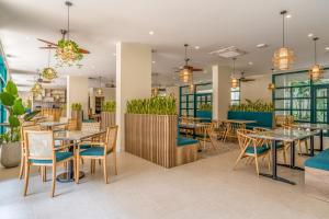 Bliss Hotel Phu Quoc 레스토랑 또는 맛집