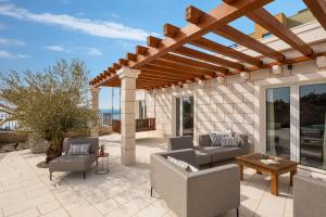 Posedenie v ubytovaní Luxury Villa Salvina