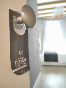 Letto o letti in una camera di Manno Rooms Affittacamere