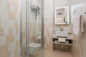 Ett badrum på Apartmani Artqart Rijeka