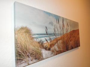a picture of a painting of a beach at Ferienwohnung Nordluft in Erfurt