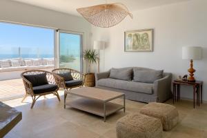 A seating area at INFINITY Sunny Home by Cadiz4Rentals