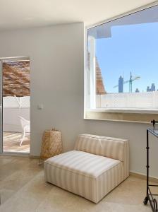 A seating area at INFINITY Sunny Home by Cadiz4Rentals