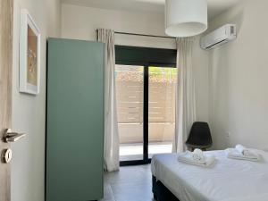 Posteľ alebo postele v izbe v ubytovaní PETRA RESIDENCES IN LINDOS