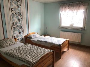 Ein Bett oder Betten in einem Zimmer der Unterkunft Monteurunterkunft Oberhausen-Rheinhausen