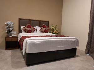 Postel nebo postele na pokoji v ubytování KB HOTEL