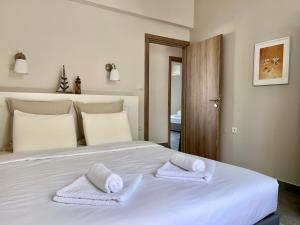 Posteľ alebo postele v izbe v ubytovaní PETRA RESIDENCES IN LINDOS