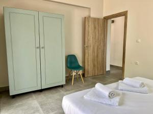 Posteľ alebo postele v izbe v ubytovaní PETRA RESIDENCES IN LINDOS