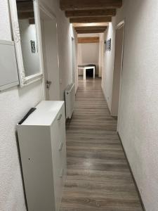 an empty hallway of an office building with a hallway at Bürgerstüble in Donaueschingen