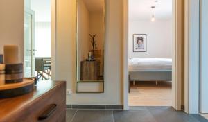 Postel nebo postele na pokoji v ubytování Apartments Traunkai Bad Ischl