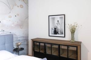 Postel nebo postele na pokoji v ubytování Apartments Traunkai Bad Ischl
