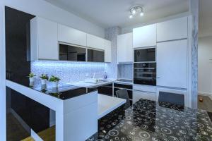 Dapur atau dapur kecil di Pleasure Lux1 Apartment