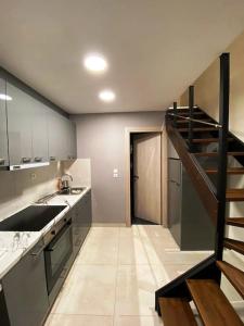 Kuchyňa alebo kuchynka v ubytovaní Luxury Loft Kalu Tsesme B