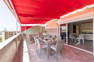 Un restaurant sau alt loc unde se poate mânca la Penthouse Manureva by Pajarito Holidays