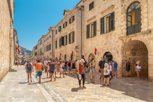 a group of people standing in front of a building at Kenova apartment Old Town in Dubrovnik