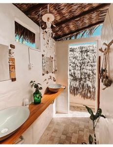 Ванная комната в Vila Prana