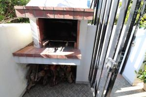 Rõdu või terrass majutusasutuses Trilo barbecue Torre dell'orso Pt48