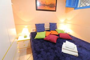 Voodi või voodid majutusasutuse Trilo barbecue Torre dell'orso Pt48 toas