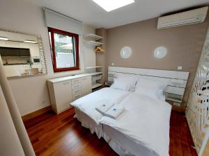 Posteľ alebo postele v izbe v ubytovaní Apartment Emily + 31 fotografií