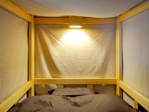 Postel nebo postele na pokoji v ubytování Guest House Takazuri-KITA